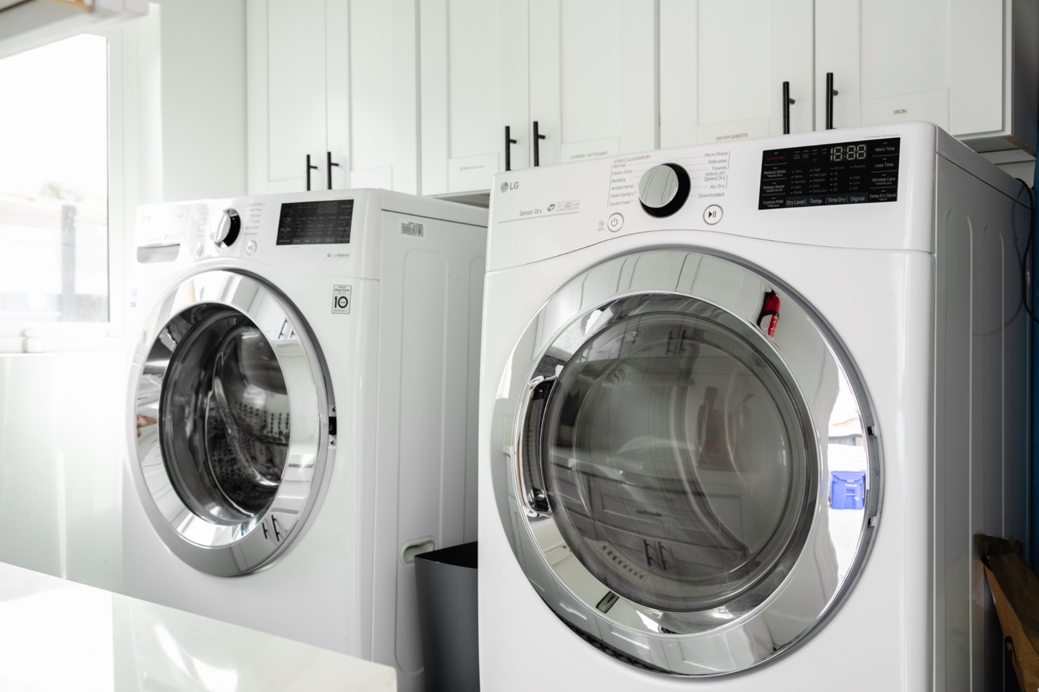 Full-size washer and dryer in the Birdhouse laundry room